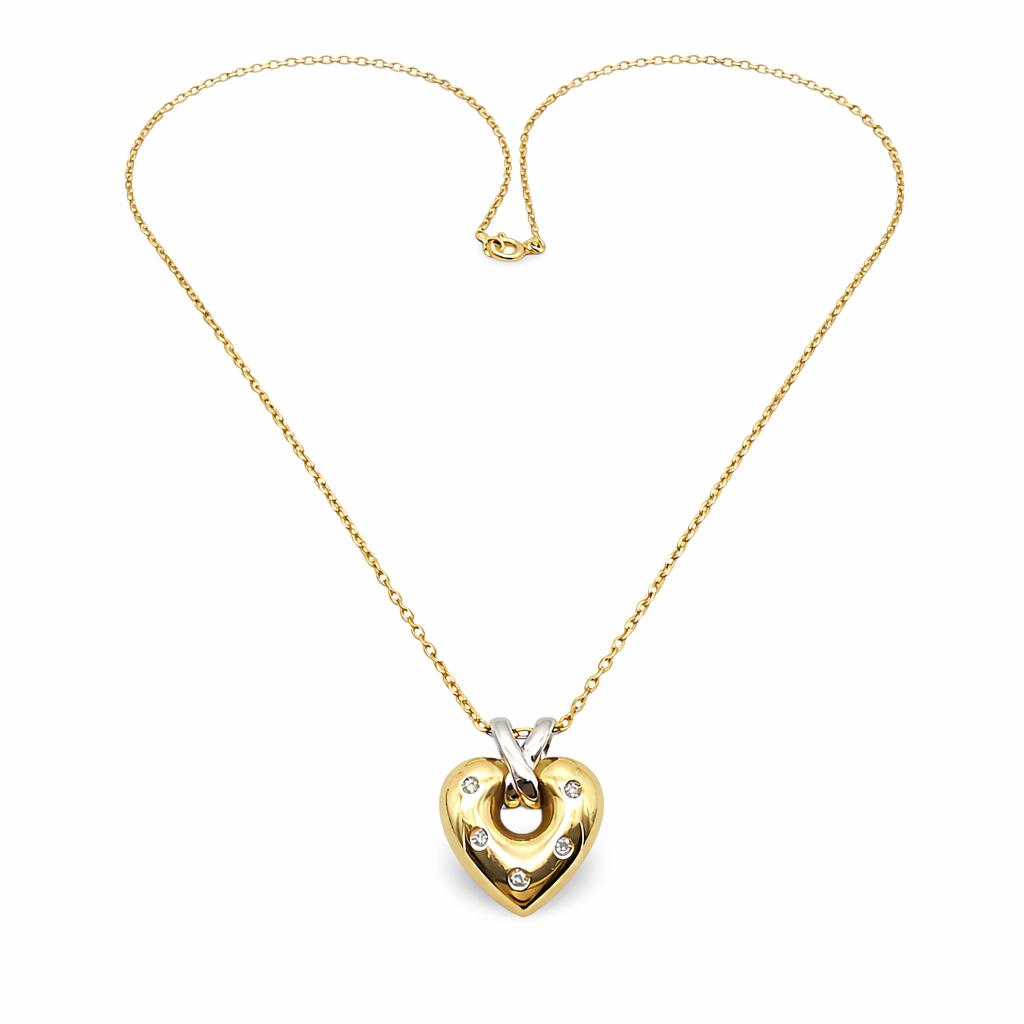 Collier en or jaune 18 carats avec pendentif cœur serti de cinq diamants naturels taille brillant, bijou vintage authentique proposé par GemmeLuxe.
