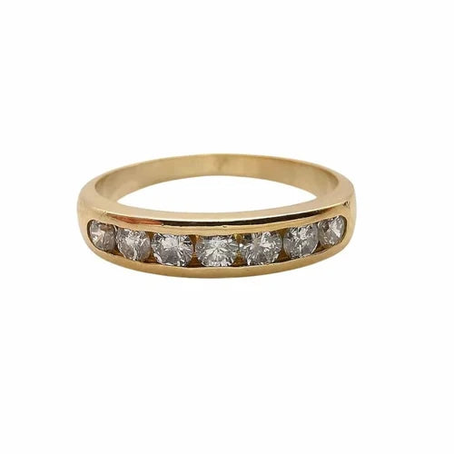 Bague demi-alliance en or jaune 18 carats sertie de 7 diamants naturels taille brillant totalisant environ 0,49 carat, proposée par GemmeLuxe.