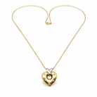 Collier en or jaune 18 carats avec pendentif cœur serti de cinq diamants naturels taille brillant, bijou vintage authentique proposé par GemmeLuxe.