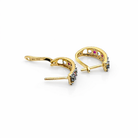 Arrière des boucles d’oreilles vintage en or jaune 18 carats avec système de fermeture