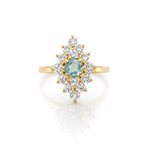Bague marquise topaze bleue et oxydes de zirconium en or jaune 18 carats