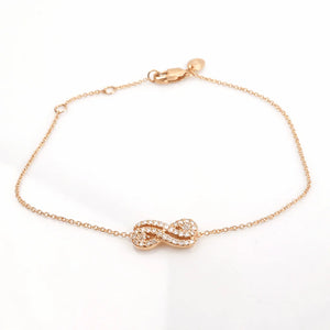 Bracelet Guérin infini en or rose 18 carats et diamants 0,38 ct