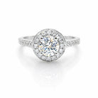 Bague halo en or blanc 18 carats sertie de diamants, avec diamant central de 0,60 carat